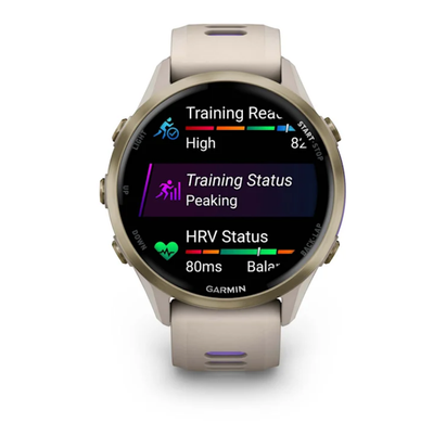 Смарт-годинник Garmin Forerunner 970 із золотистим титановим безелем, сірим корпусом і ремінцем кольору французький сірий/індиго
